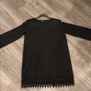 Black long sleeve dress with lace hem